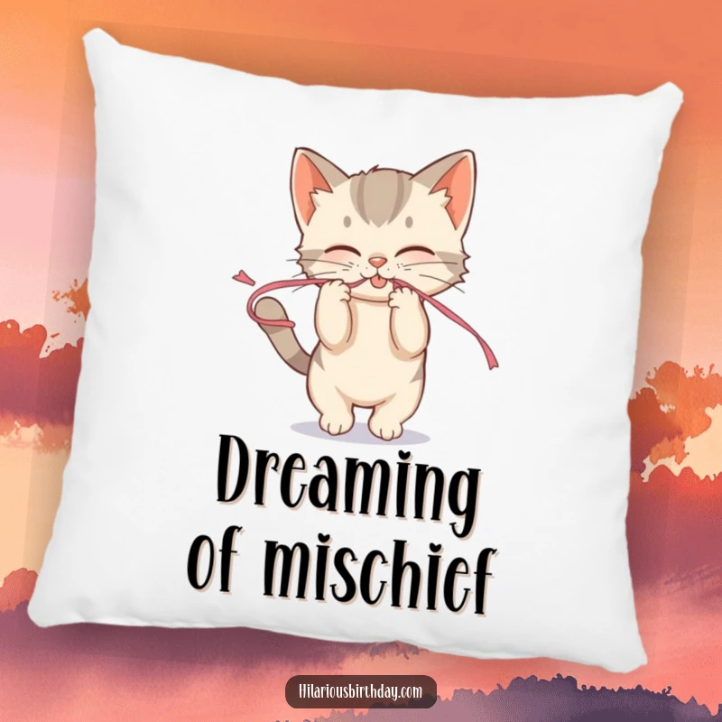 Funny mischievous kitten playfully tugging on a streamer on a soft pillow, offering cozy playful comfort.