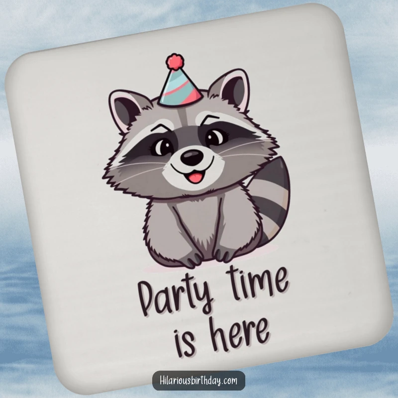 Funny raccoon drink coaster featuring a beaming raccoon wearing a silly, oversized party hat and a cheerful expression.