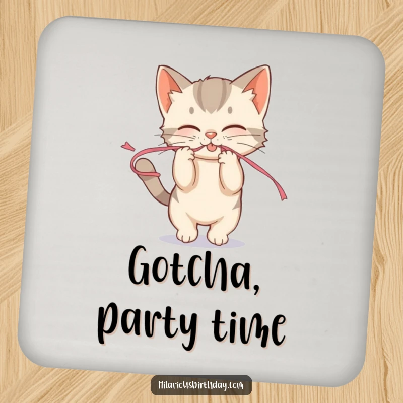 Funny mischievous kitten playfully tugging on a streamer on a drink coaster, adding playful fun to surfaces.