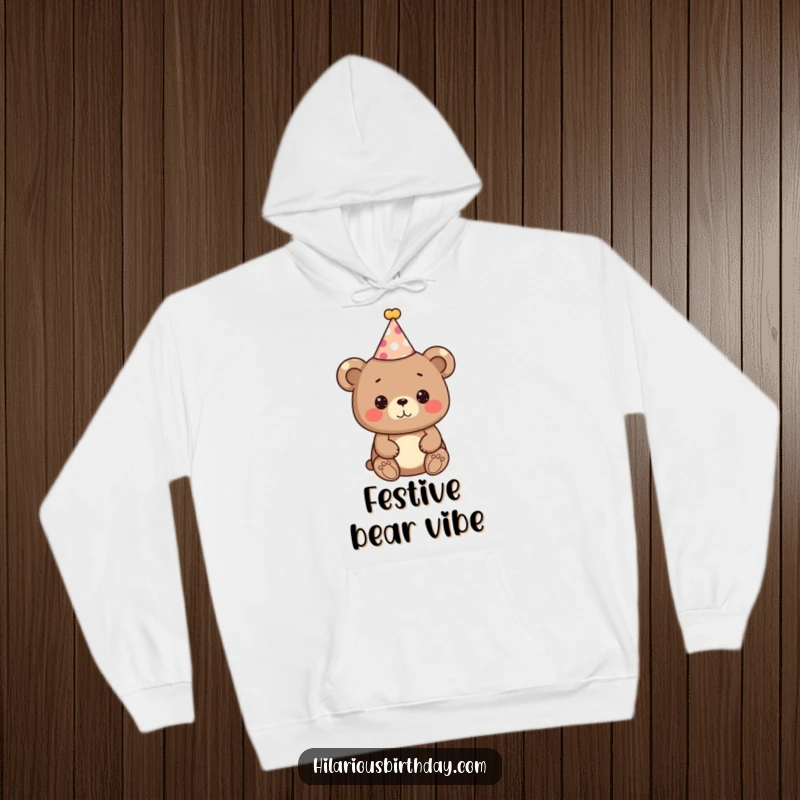 Funny bear hoodie, a cute bear character wearing a festive party hat, ready to celebrate, cozy festive wear.