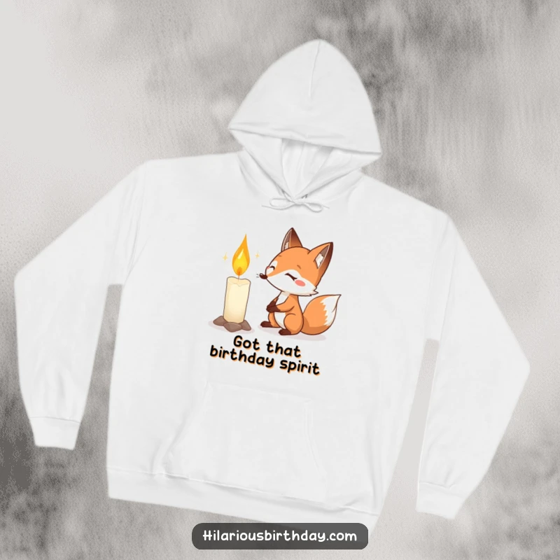 Funny fox birthday hoodie displaying a determined fox heroically attempting to blow out a massive birthday candle.