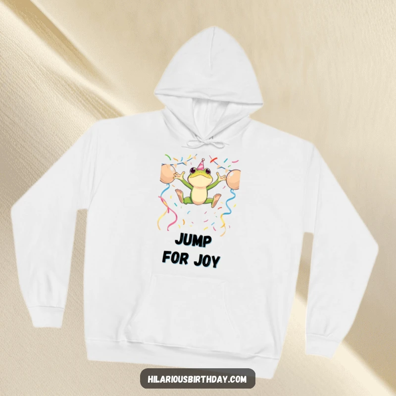 Funny hoodie featuring an energetic frog character leaping over party streamers, offering comfort and a burst of festive energy.
