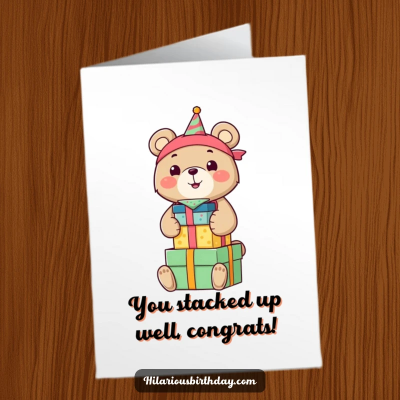 Funny Free Printable congratulations card of a smiling bear wearing a birthday bandana, gleefully stacking colorful gift boxes.