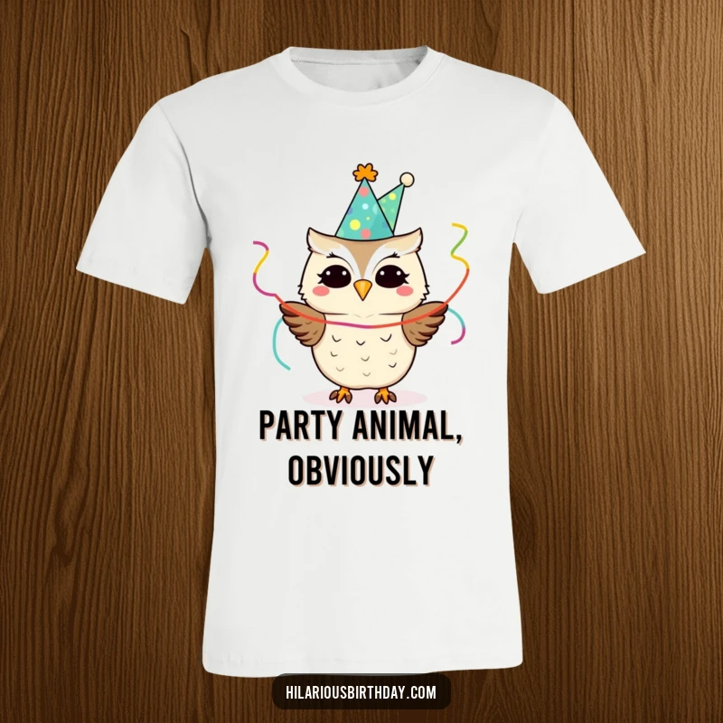 Funny delighted owl wearing a party hat and holding streamers, printed on a t-shirt, a fun and funny gift.