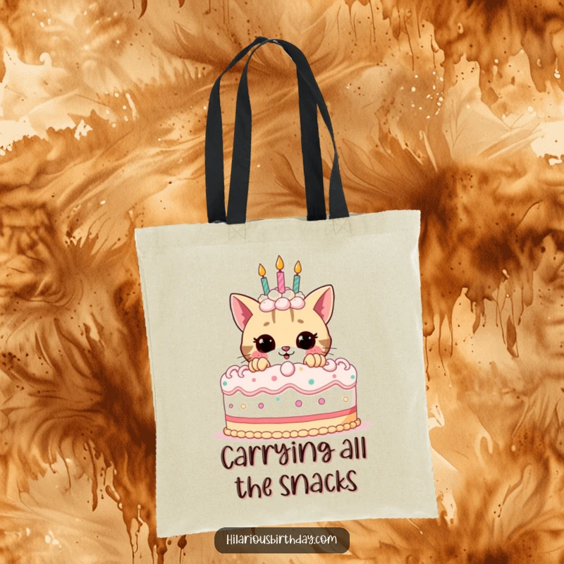 Funny birthday tote bag showcasing a cute cat peeking from behind a large, decorated birthday cake, highlighting playful anticipation.