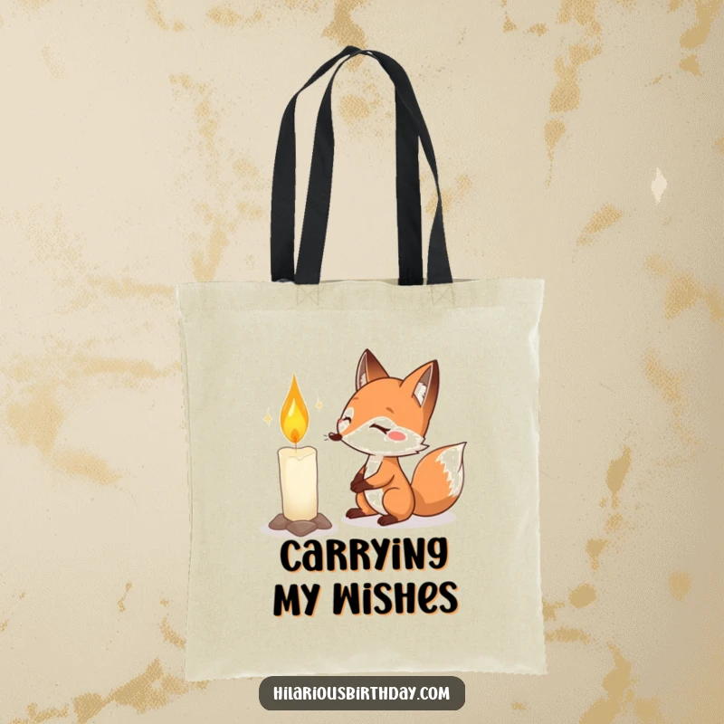 Funny fox birthday tote bag illustrating a determined fox with puffed cheeks, aiming to extinguish a large birthday candle.