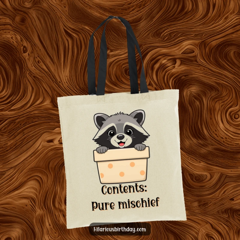 Funny raccoon tote bag illustration, a masked bandit peeking out of a wrapped gift. Eco-friendly and amusing.